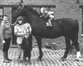 Historic photograph of Lugano van la Roche with people beside him